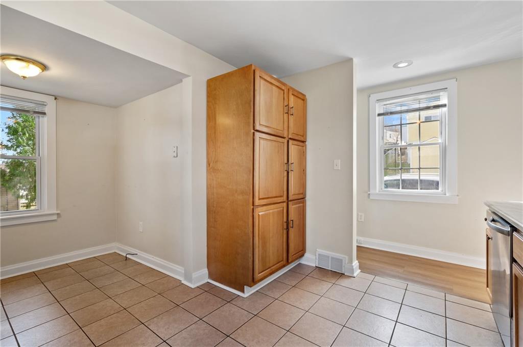 320 Newkirk Avenue Carnegie, PA 15106 - Photo 5 of 25 a view of an empty room with window and chandelier fan