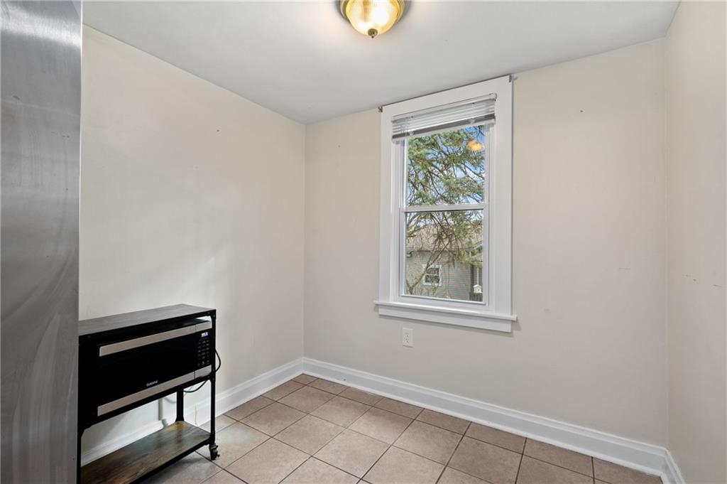 320 Newkirk Avenue Carnegie, PA 15106 - Photo 9 of 25 a view of an empty room with a window