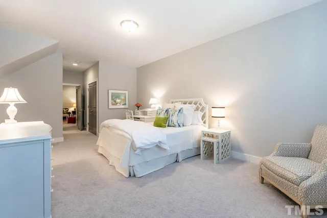 a bed room with a bed and a couch