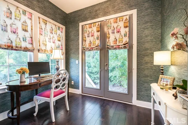 a workspace with furniture and a window