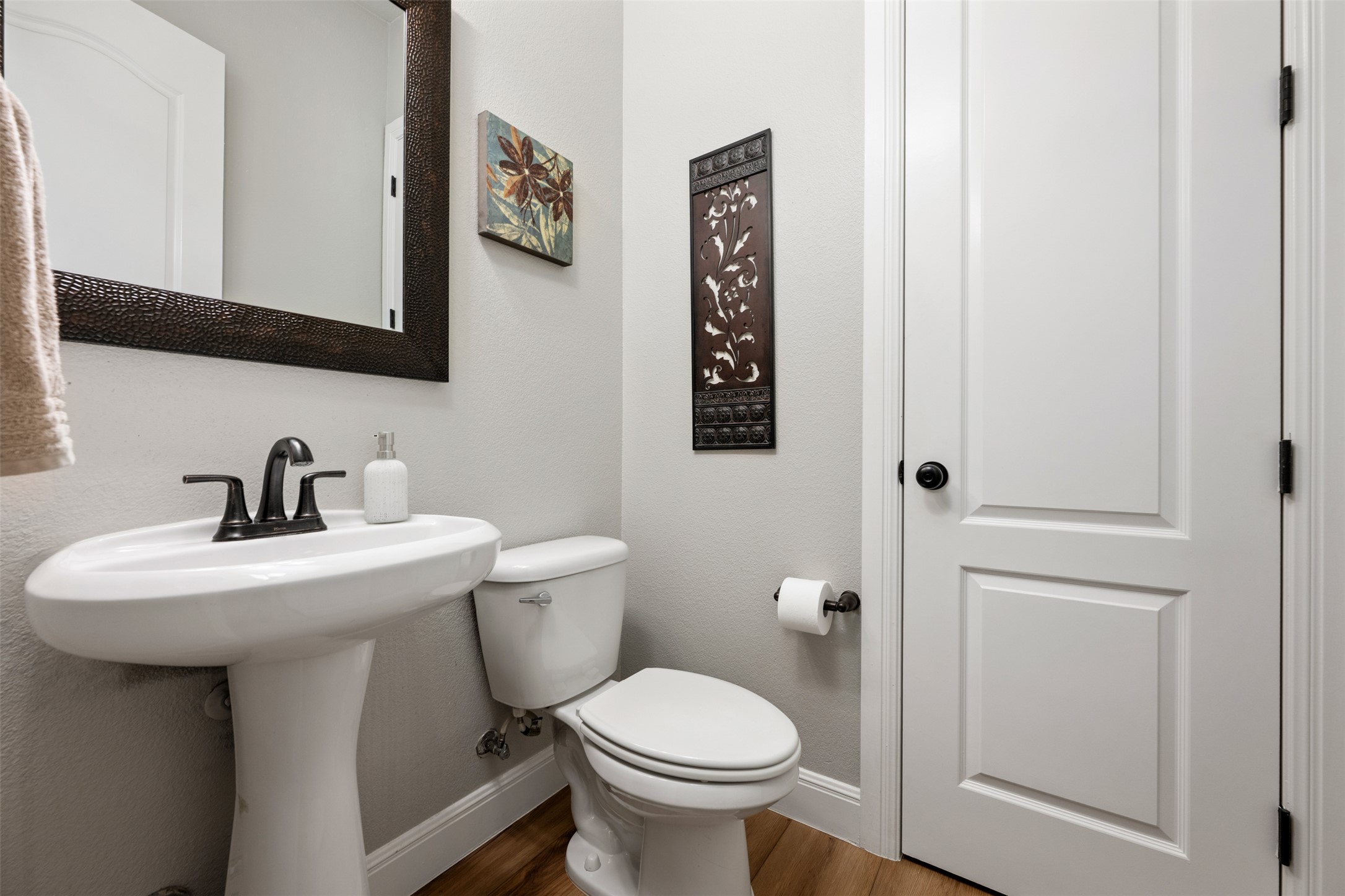 3021 Wedgescale Pass Leander, TX 78641 - Photo 17 of 40 a bathroom with a toilet sink and mirror