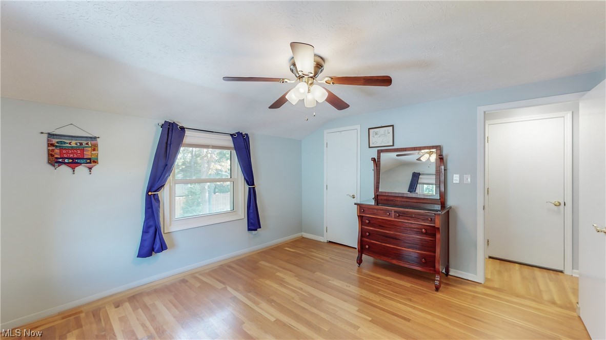 1881 Winchester Road Cleveland, OH 44124 - Photo 21 of 27 Bedroom featuring light hardwood flooring and ceiling fan