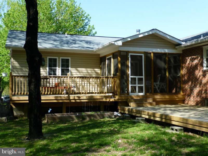 7406 Mulberry Road Hanover, MD 21076 - Photo 3 of 26 Screened Porch & Tiered Deck