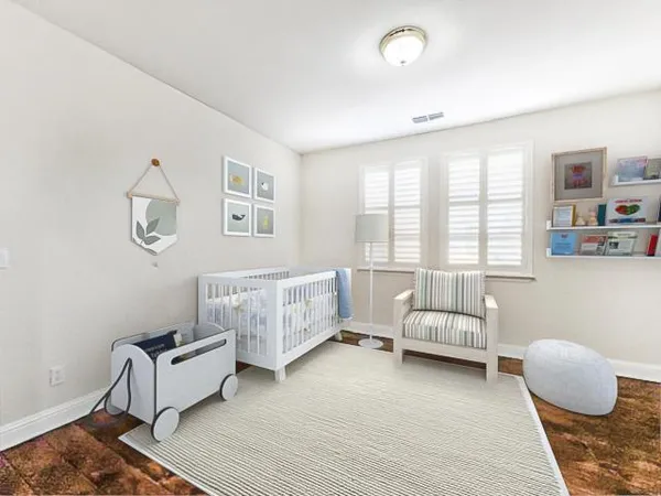 a bedroom with furniture and a couch