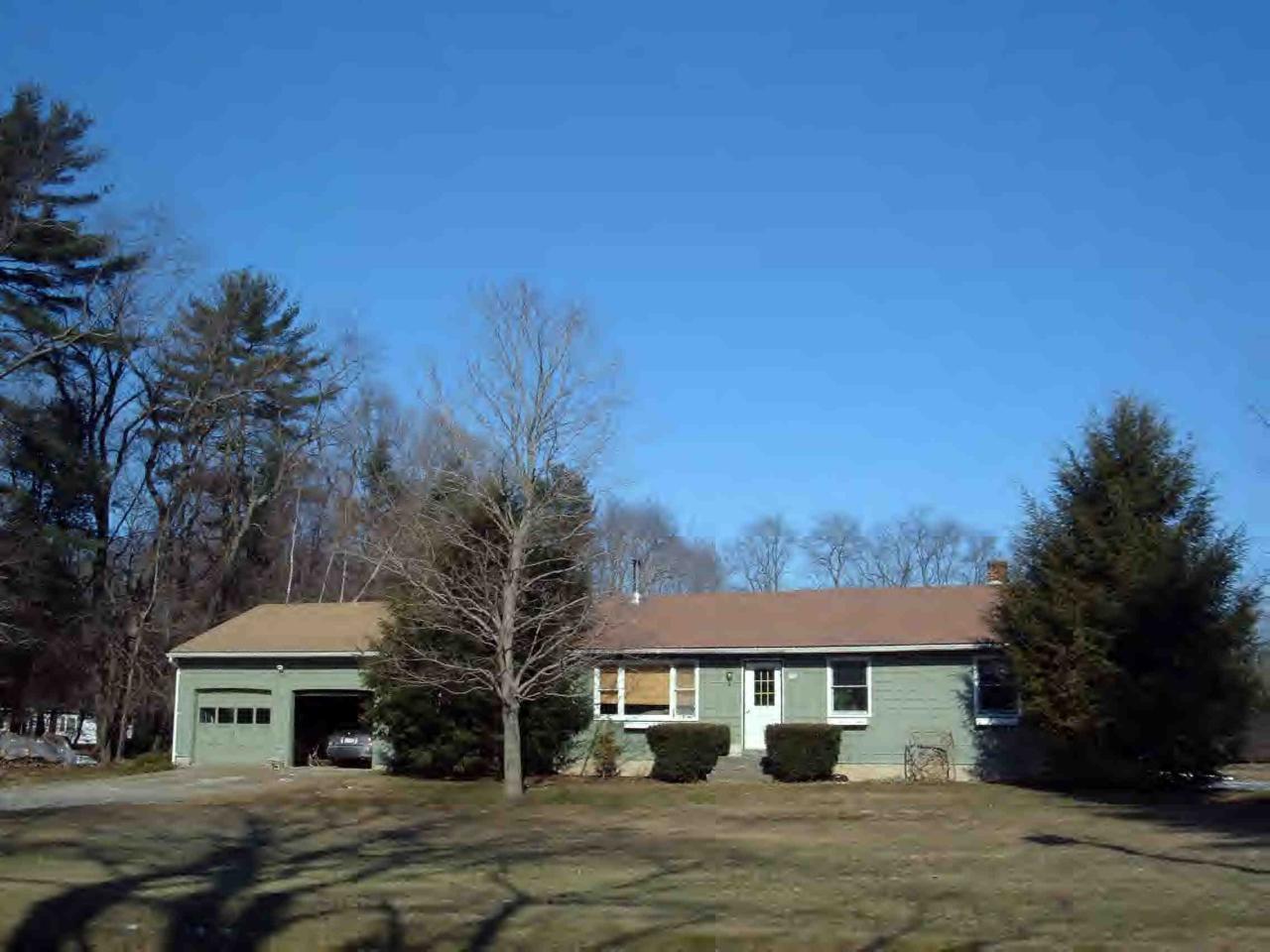 254 Salisbury Road Sheffield, MA 01257 - Photo 1 of 1 a front view of a house with a garden