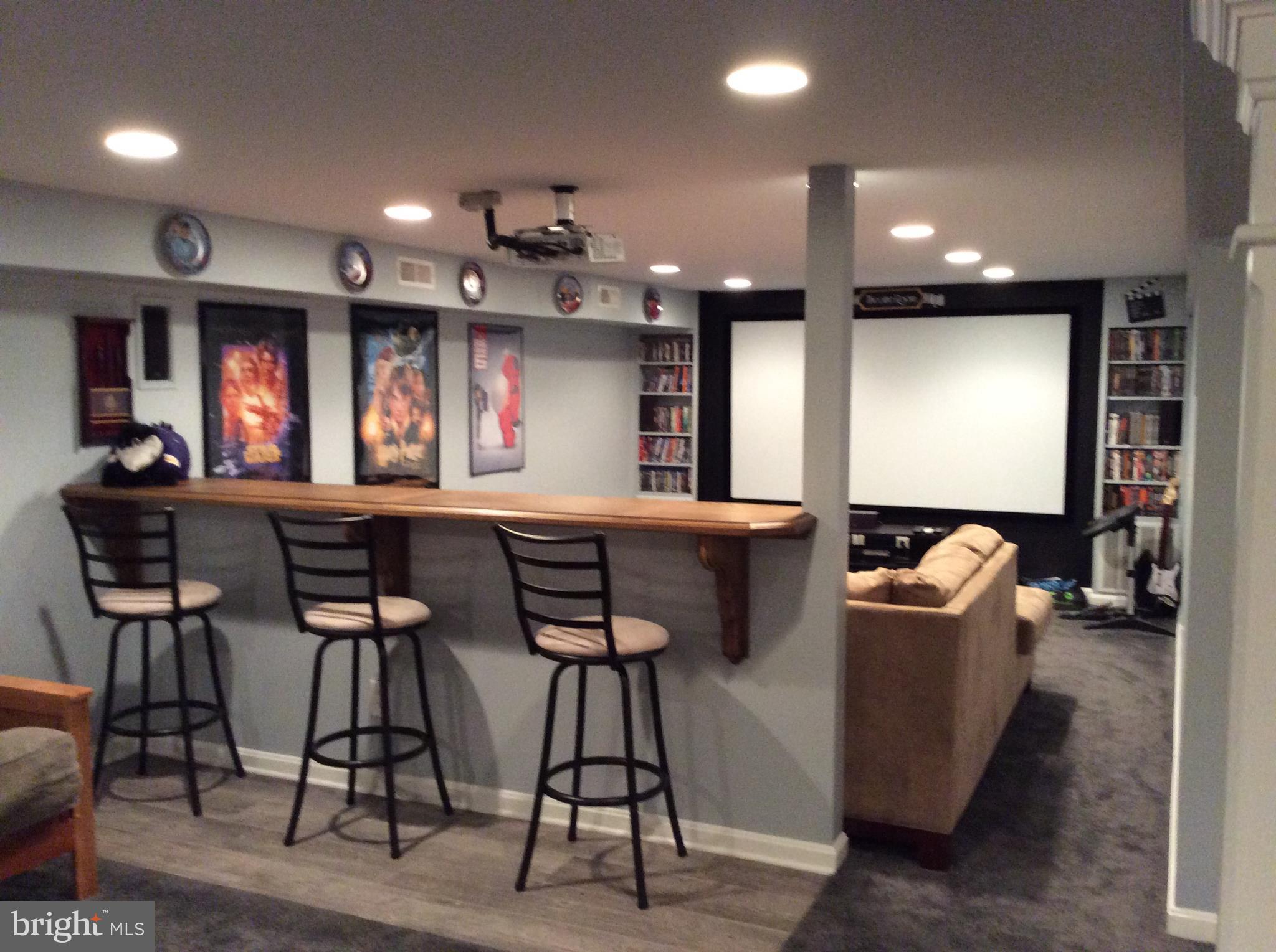 2122 Ruffs Mill Road Bel Air, MD 21015 - Photo 4 of 19 Custom wood bar overlooking theater area