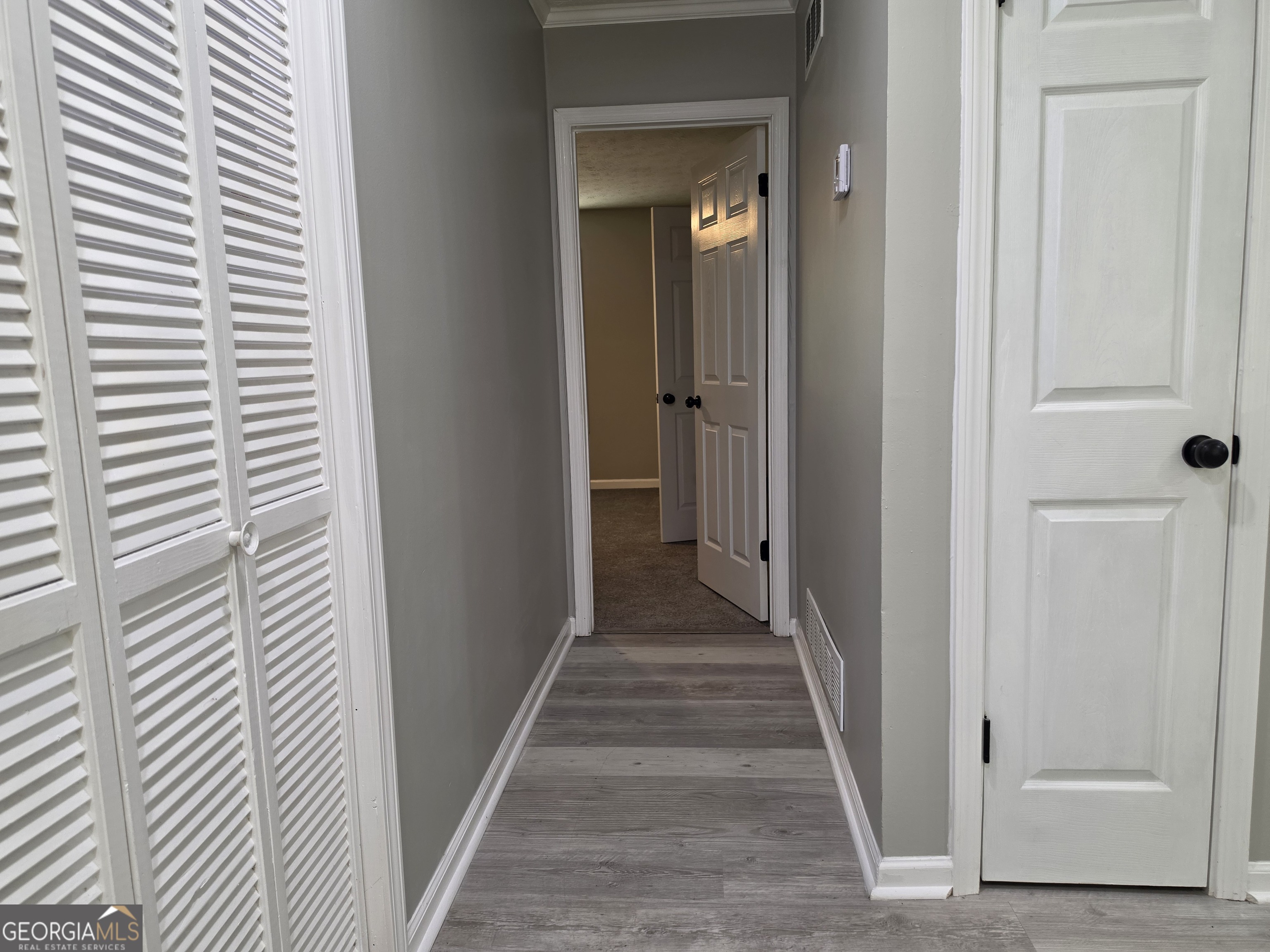 586 Ridge Avenue Mableton, GA 30126 - Photo 24 of 29 HALLWAY TO PRIMARY BEDROOM
