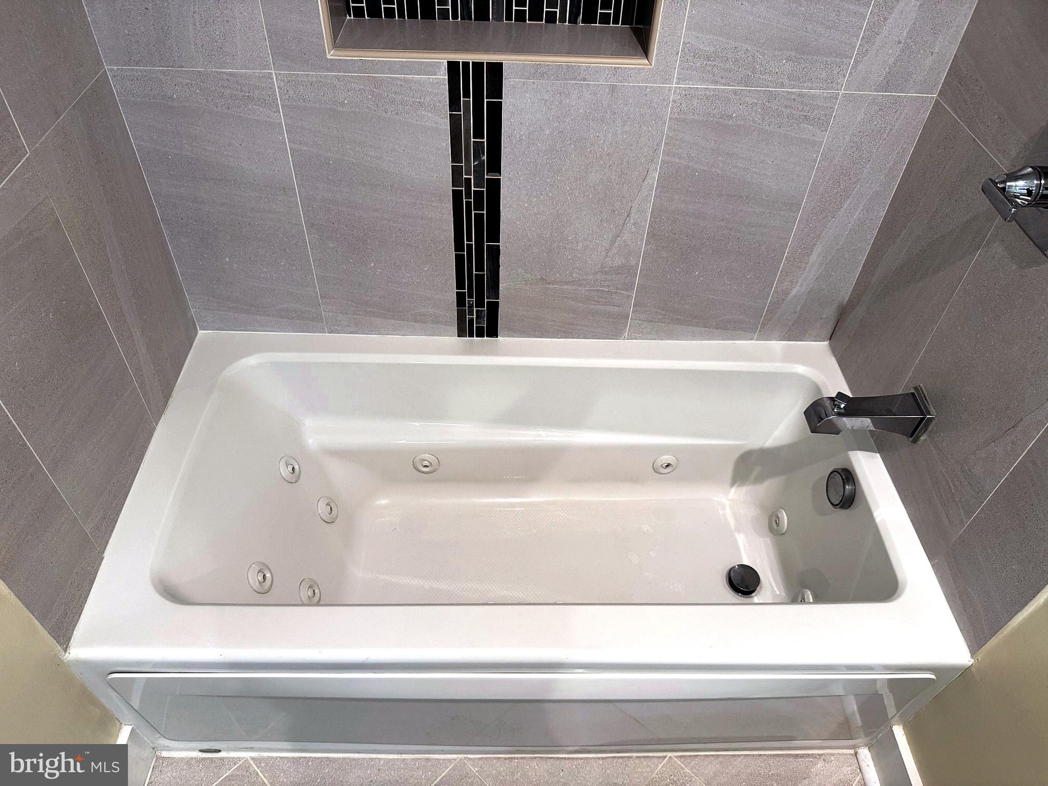 625 Park Road Northwest Washington, DC 20010 - Photo 21 of 22 Sleek spa-like bathtub retreat.