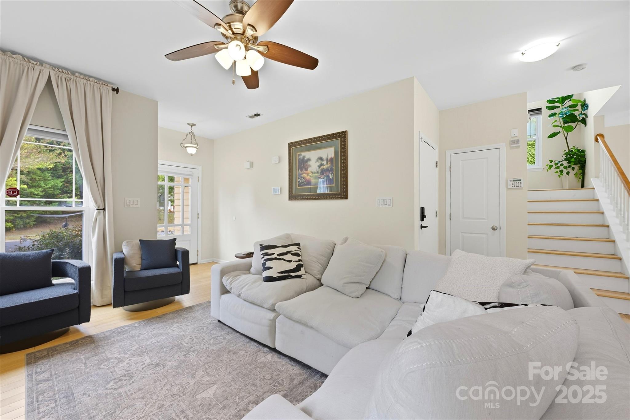 13308 Bolingbrook Lane Charlotte, NC 28273 - Photo 13 of 34 a living room with furniture and a large window