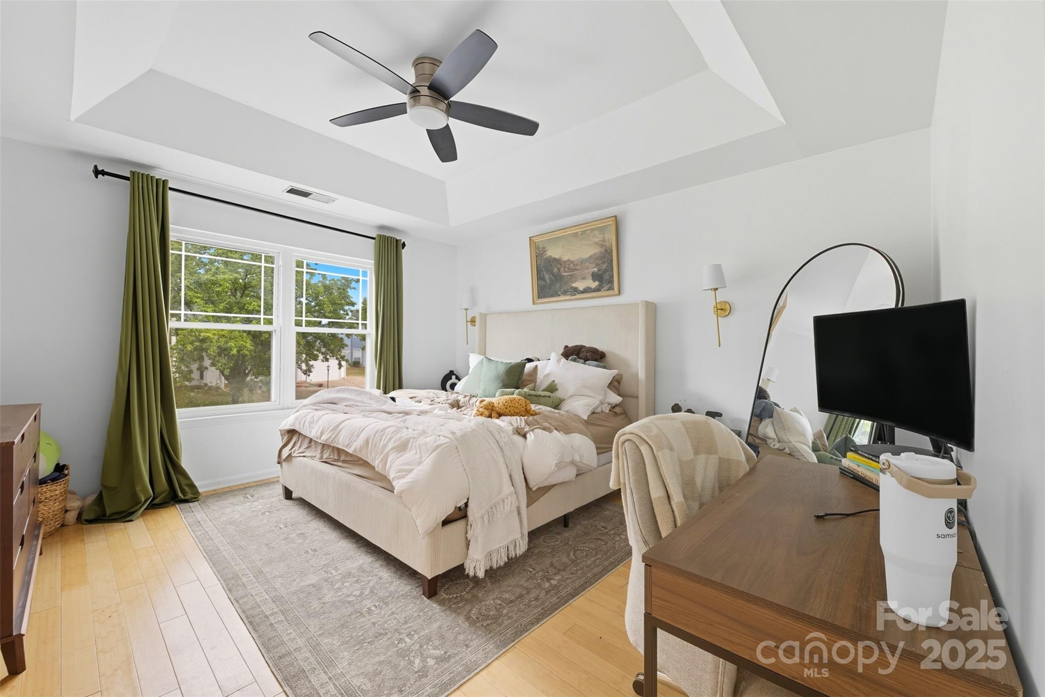 13308 Bolingbrook Lane Charlotte, NC 28273 - Photo 14 of 34 a bedroom with bed a flat tv screen and a large window