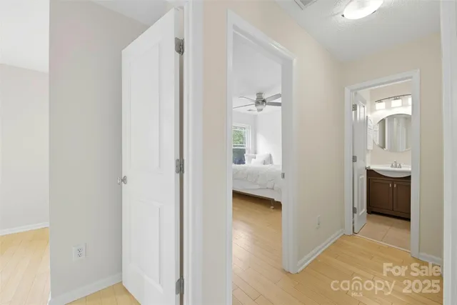 a view of a bathroom from the hallway