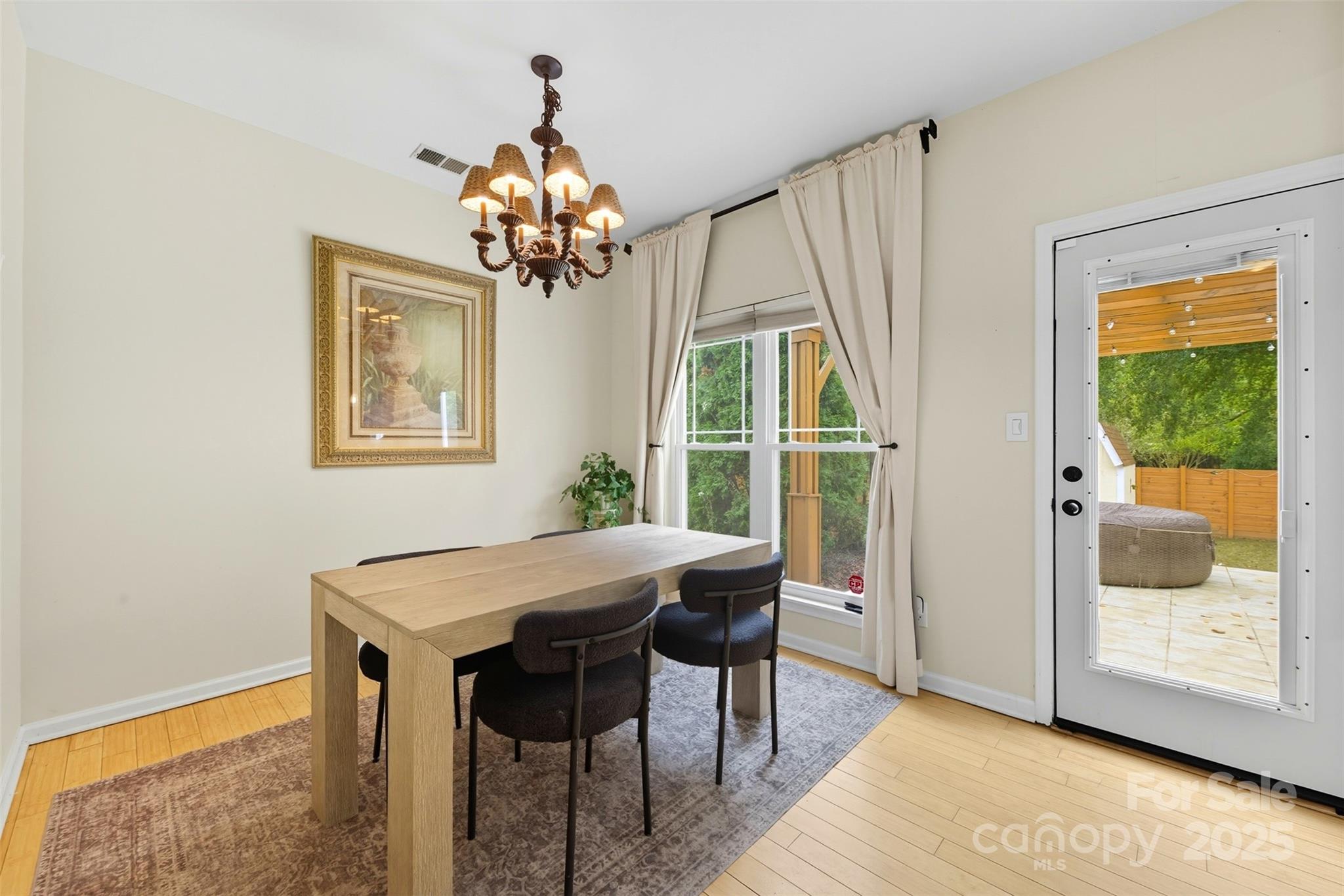 13308 Bolingbrook Lane Charlotte, NC 28273 - Photo 7 of 34 a view of a dining room with furniture window and outside view