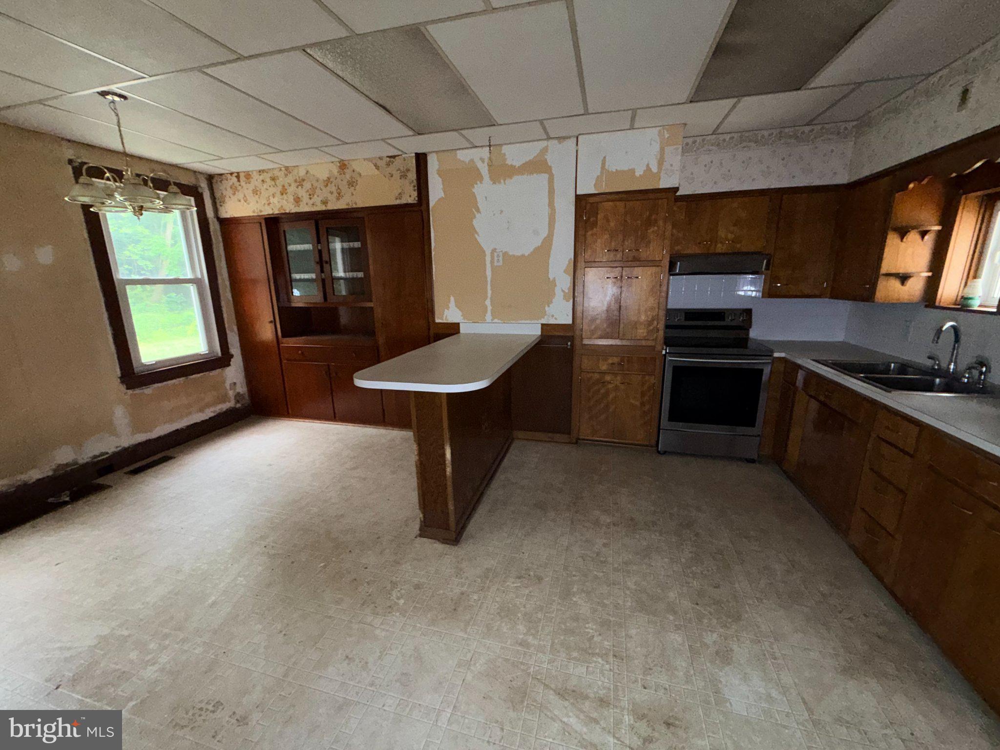 18705 Temperance Row Barton, MD 21521 - Photo 28 of 62 Spacious kitchen with renovation potential.
