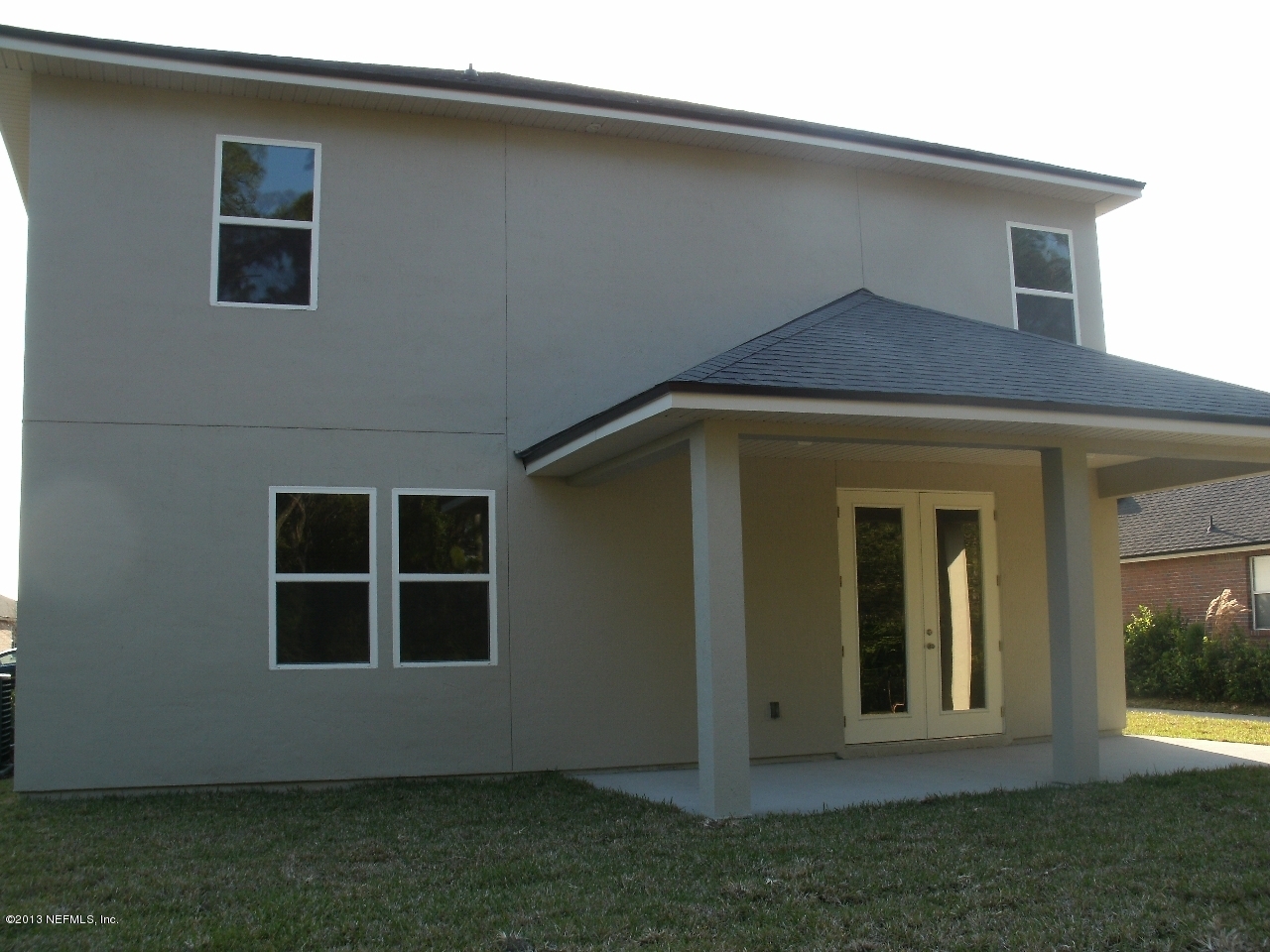 787 East Red House Branch Road St. Augustine, FL 32084 - Photo 29 of 29 a front view of a house with a yard