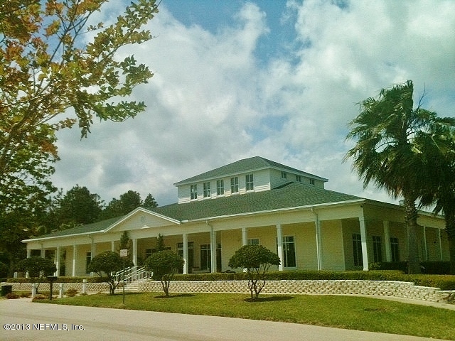 787 East Red House Branch Road St. Augustine, FL 32084 - Photo 5 of 29 a front view of a house with a garden