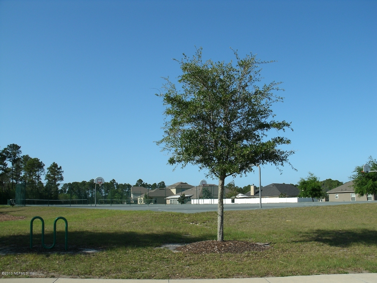 787 East Red House Branch Road St. Augustine, FL 32084 - Photo 8 of 29 a view of a lake with houses in the background