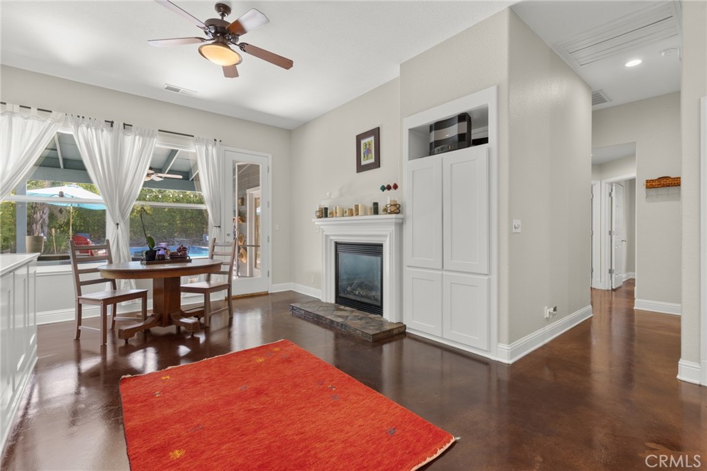 331 Weymouth Way Chico, CA 95973 - Photo 11 of 26 a view of a dining room with furniture window and wooden floor