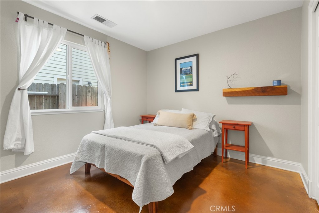 331 Weymouth Way Chico, CA 95973 - Photo 16 of 26 a bedroom with a bed and a window