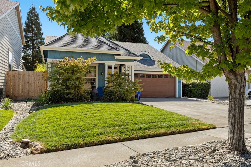331 Weymouth Way Chico, CA 95973 - Photo 18 of 26 a front view of a house with a yard