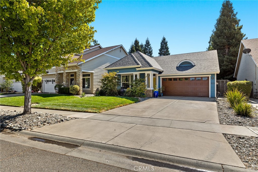331 Weymouth Way Chico, CA 95973 - Photo 19 of 26 a front view of a house with a yard and potted plants