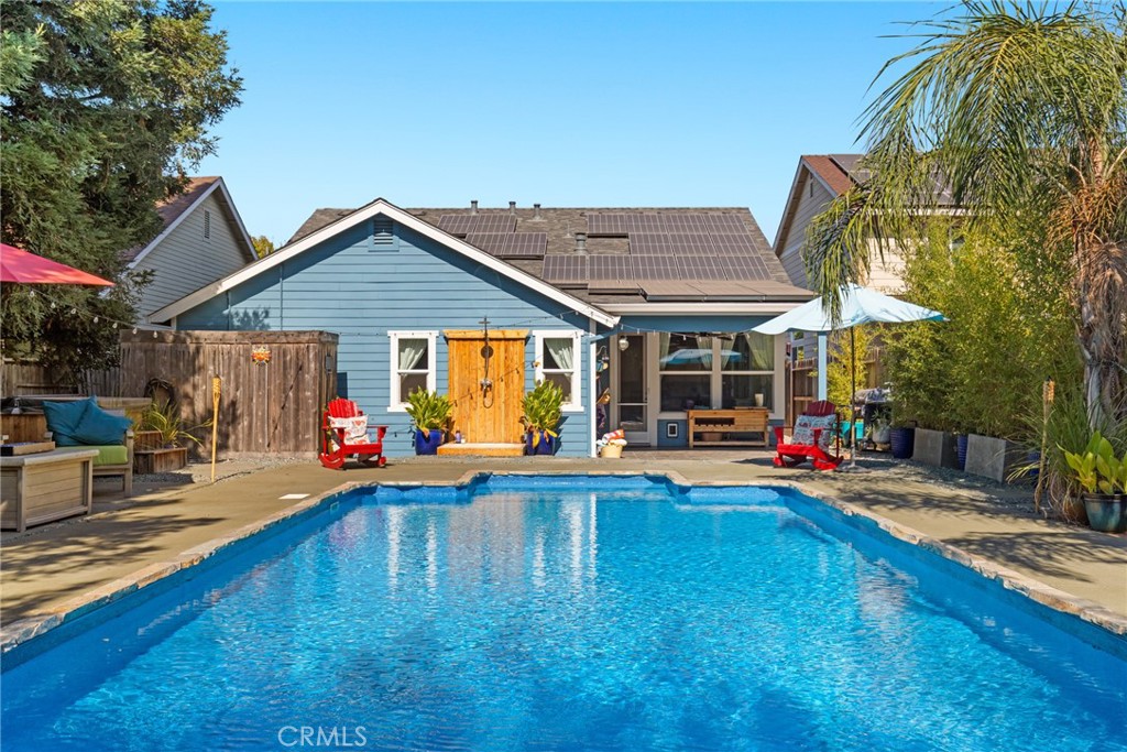 331 Weymouth Way Chico, CA 95973 - Photo 2 of 26 a view of a house with swimming pool and sitting area