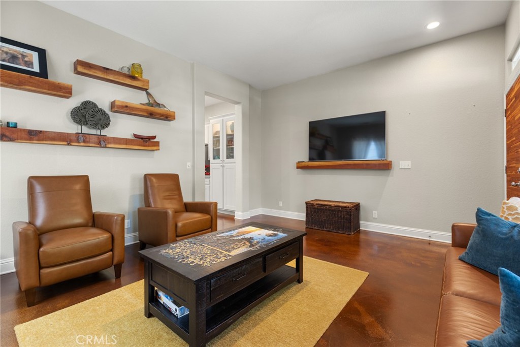 331 Weymouth Way Chico, CA 95973 - Photo 5 of 26 a living room with furniture and a flat screen tv