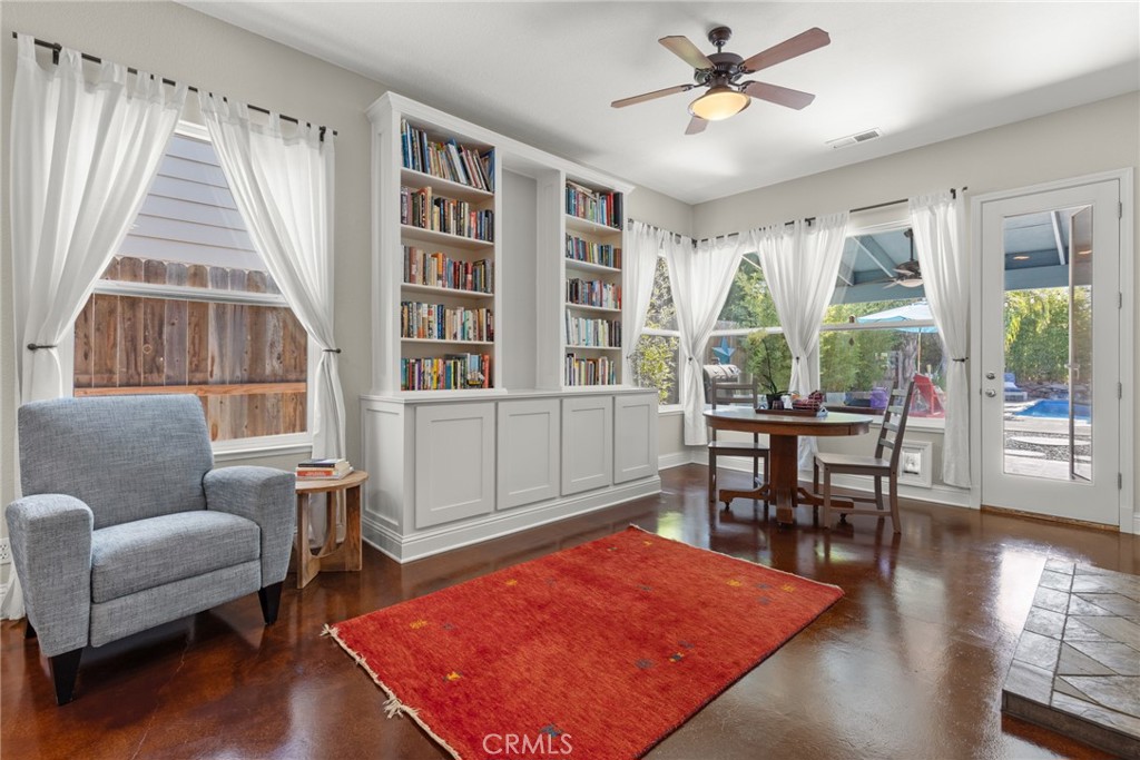 331 Weymouth Way Chico, CA 95973 - Photo 10 of 26 a living room with furniture rug and wooden floor