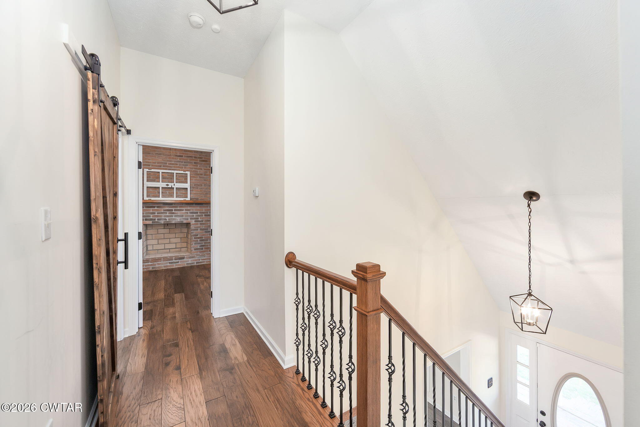 105 Center Hill-Wright Road Reagan, TN 38368 - Photo 20 of 54 a view of a hallway with wooden floor and staircase