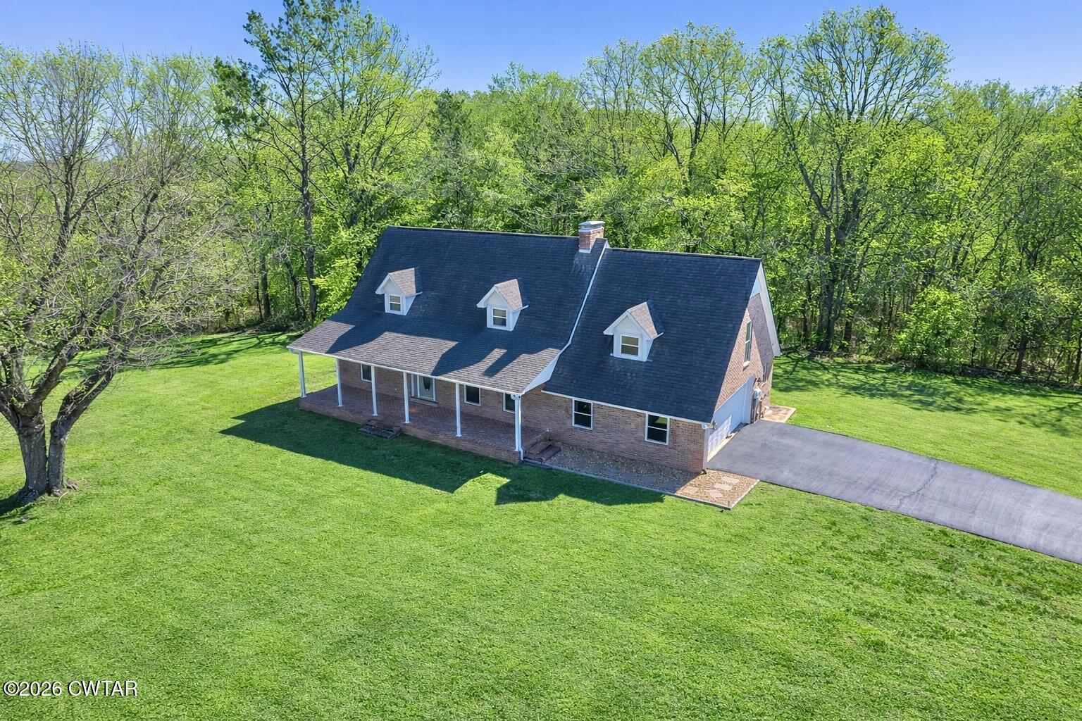 105 Center Hill-Wright Road Reagan, TN 38368 - Photo 2 of 54 an aerial view of a house
