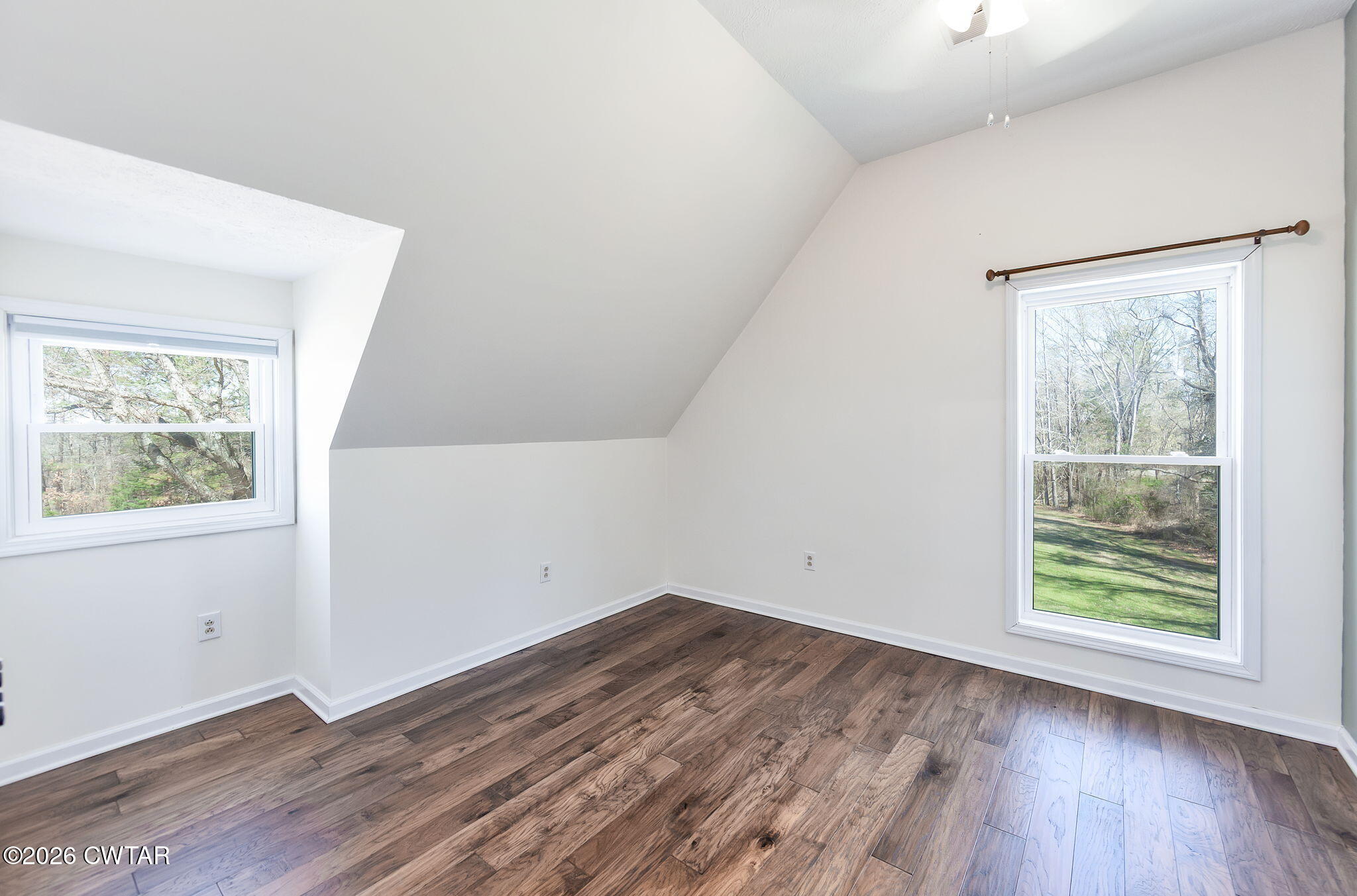 105 Center Hill-Wright Road Reagan, TN 38368 - Photo 21 of 54 an empty room with wooden floor and windows