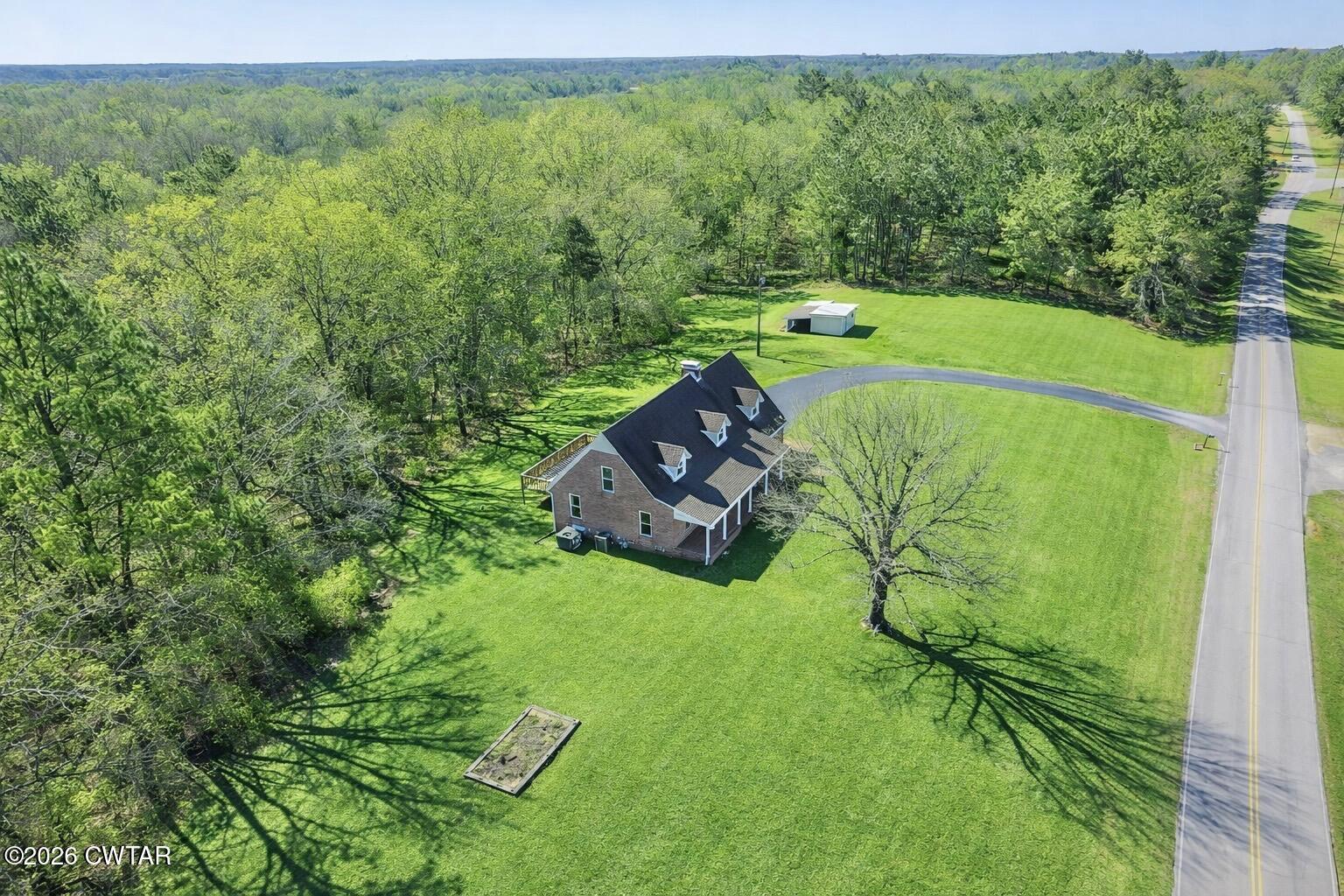 105 Center Hill-Wright Road Reagan, TN 38368 - Photo 33 of 54 a green field with trees in the background