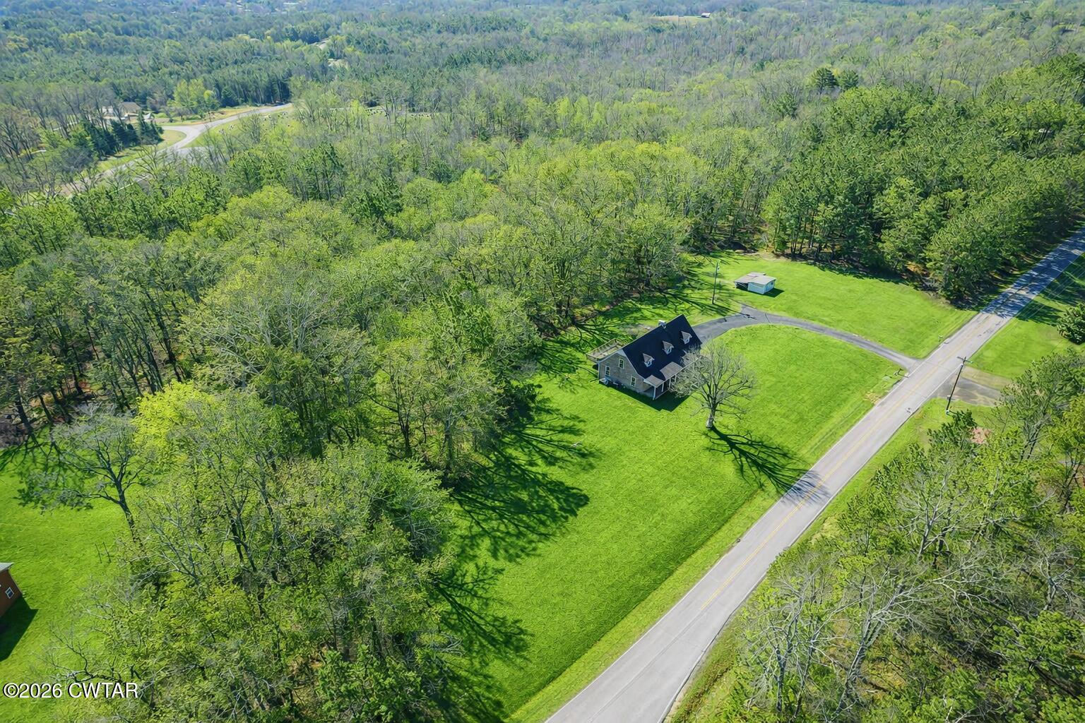 105 Center Hill-Wright Road Reagan, TN 38368 - Photo 36 of 54 a view of a green field with lots of bushes