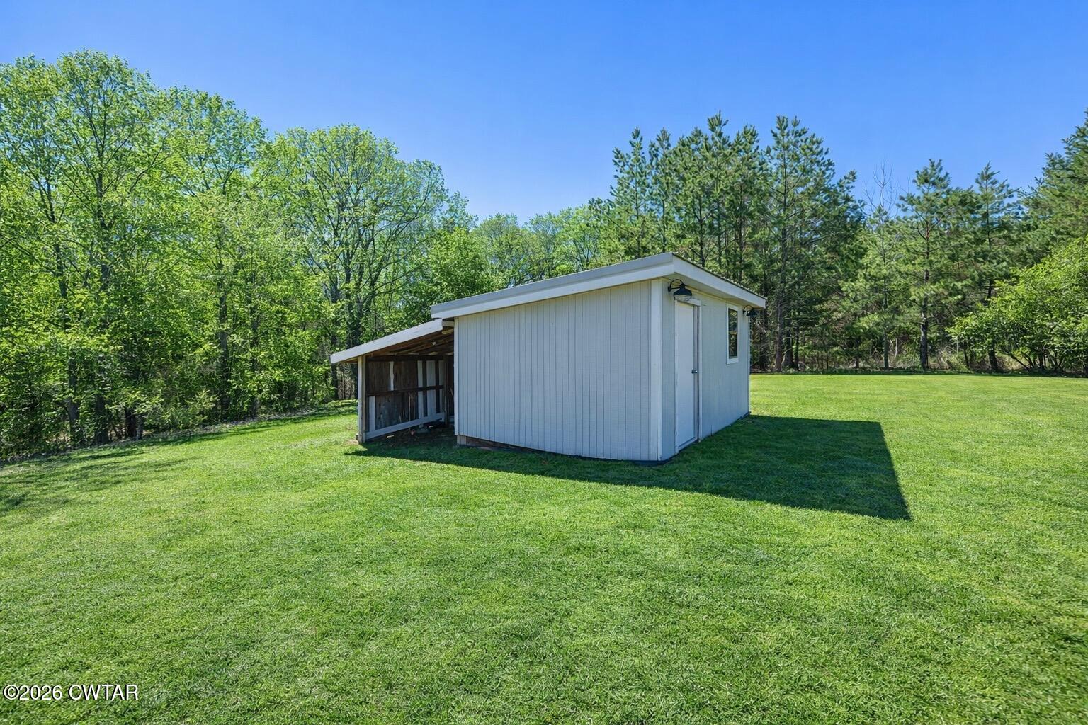105 Center Hill-Wright Road Reagan, TN 38368 - Photo 46 of 54 a backyard of a house with lots of green space