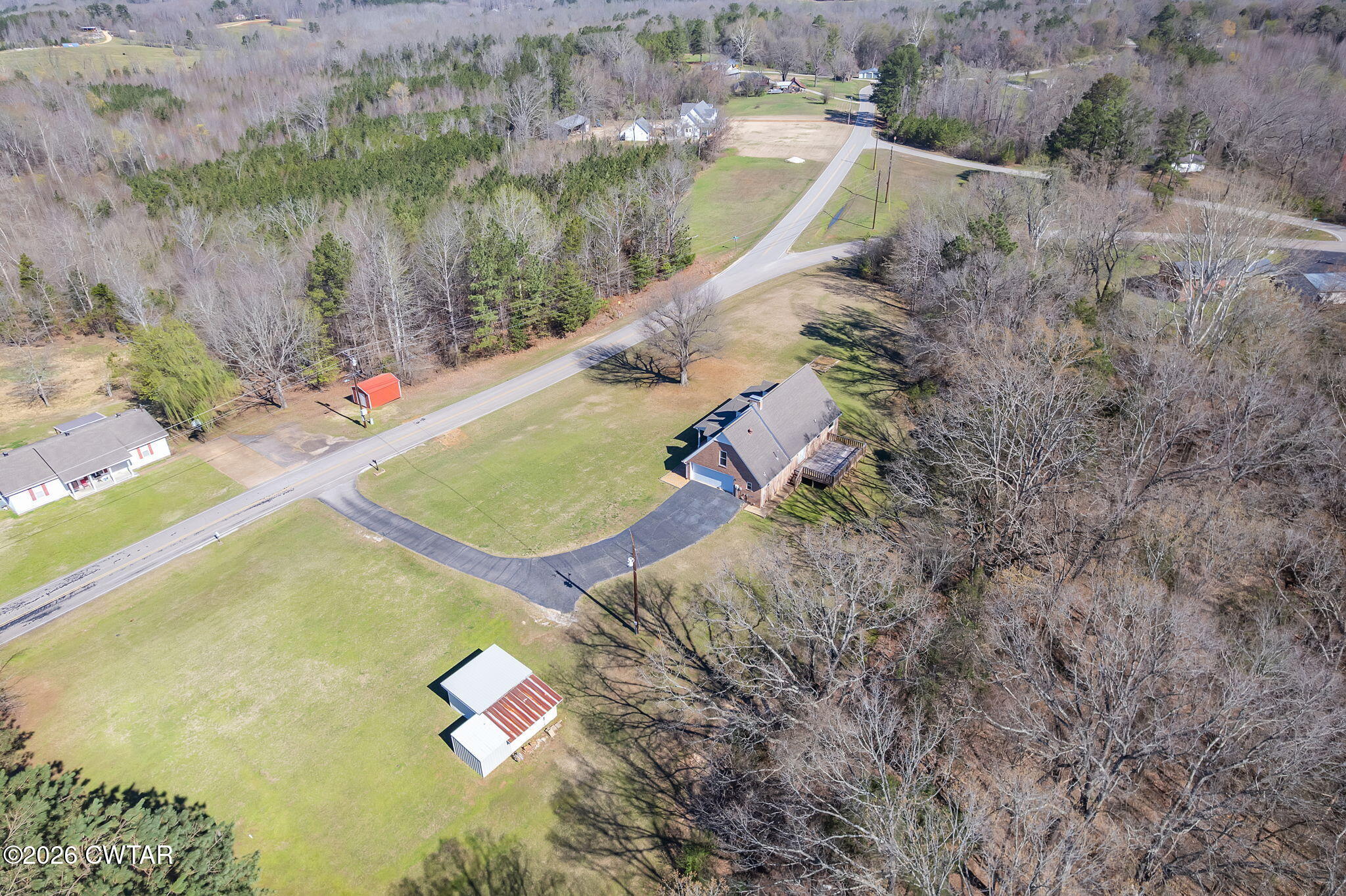 105 Center Hill-Wright Road Reagan, TN 38368 - Photo 49 of 54 an aerial view of a house with a yard and large trees