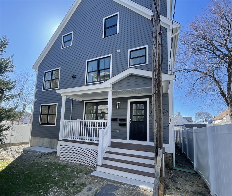 a front view of a house with a porch