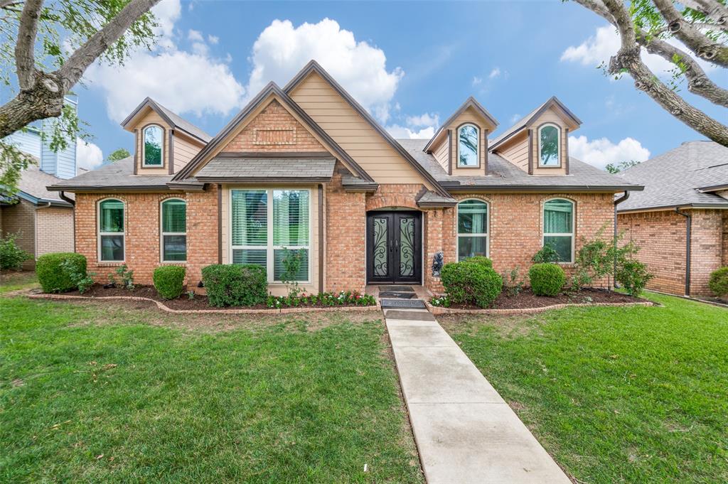 2126 Fawn Ridge Trail Carrollton, TX 75010 - Photo 1 of 1 front view of a house and a yard