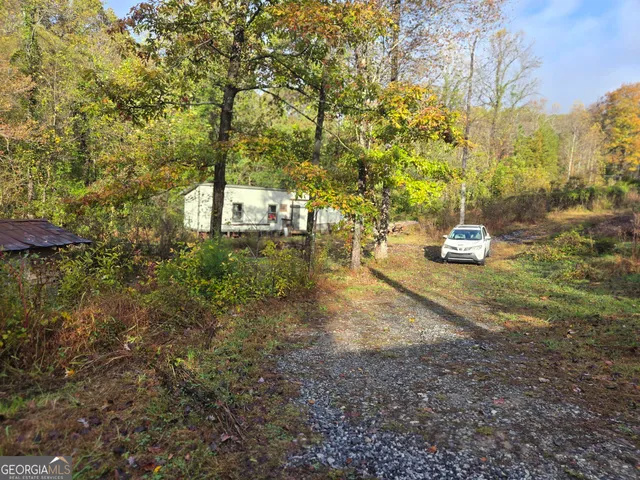 a view of a workspace with furniture and toys