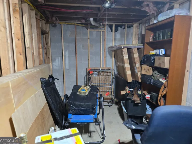 a bedroom with a bed and a closet