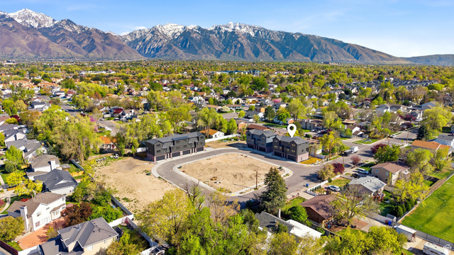330 East 7635 S Street Sandy, UT 84047 - Photo 23 of 29 View of property location with a mountain backdrop and nearby suburban area