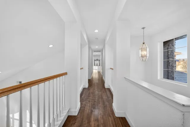 a spacious bathroom with a tub shower and sink