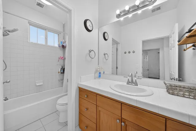 an aerial view of a house with a ocean view