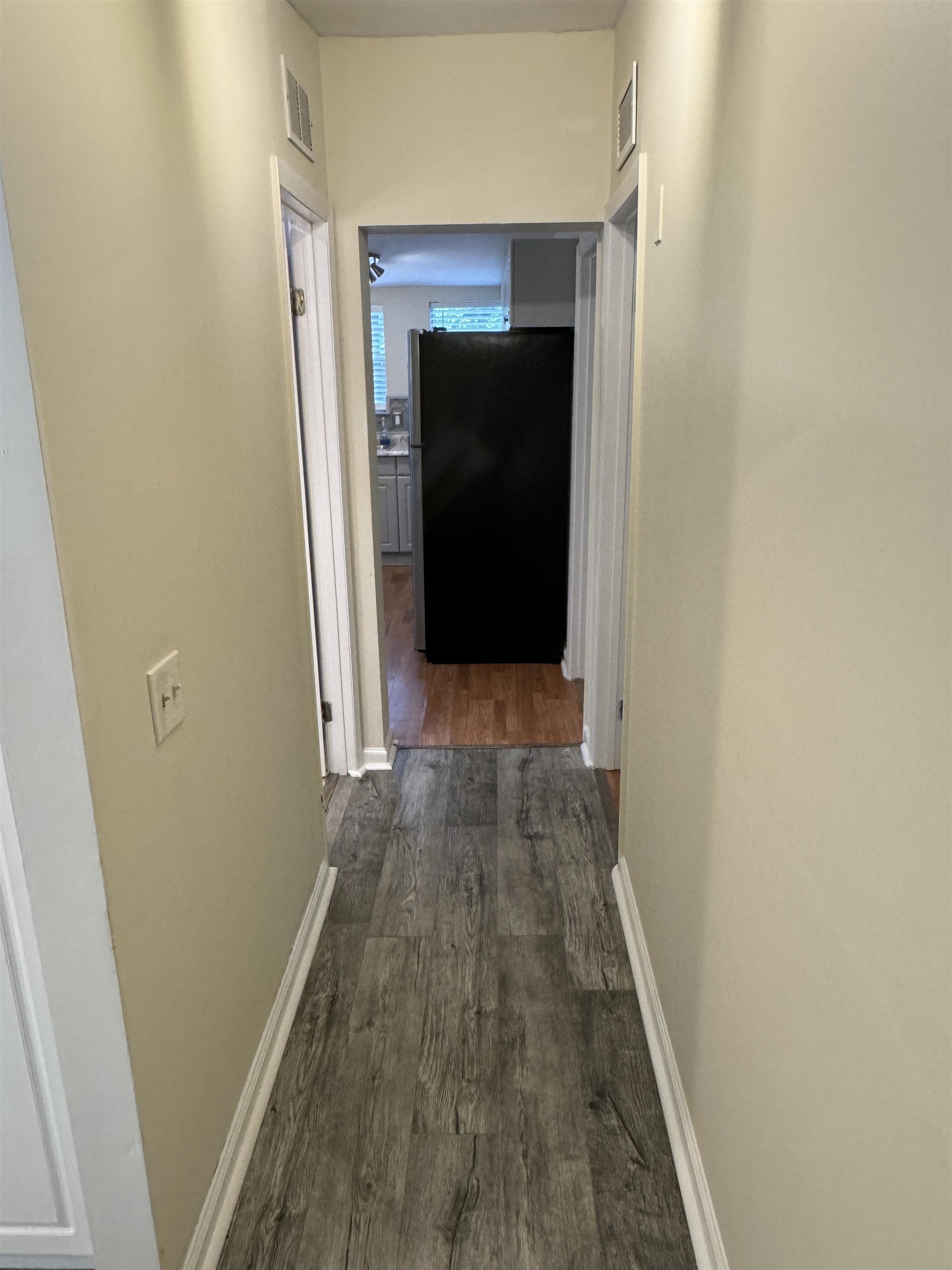 4430 Manucy Road, Unit C St. Augustine, FL 32084 - Photo 12 of 26 a view of a hallway with wooden floor