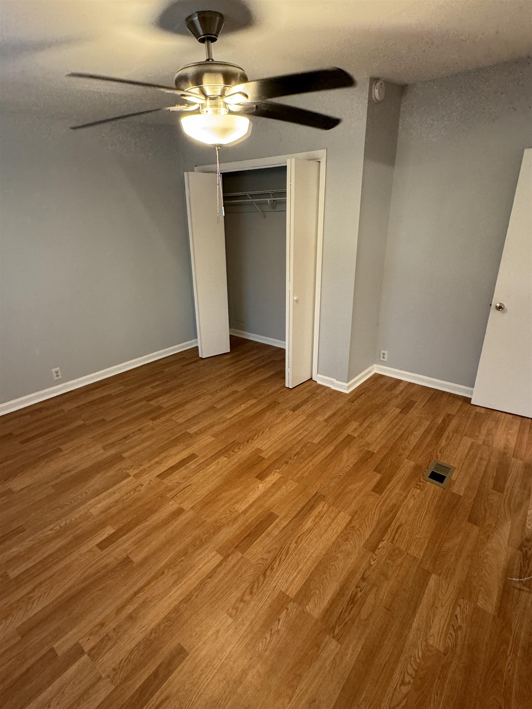 4430 Manucy Road, Unit C St. Augustine, FL 32084 - Photo 16 of 26 a view of empty room with wooden floor