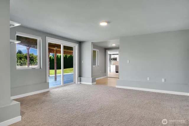 a view of a livingroom with a staircase