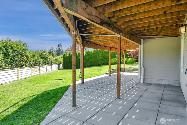 a view of yard with porch