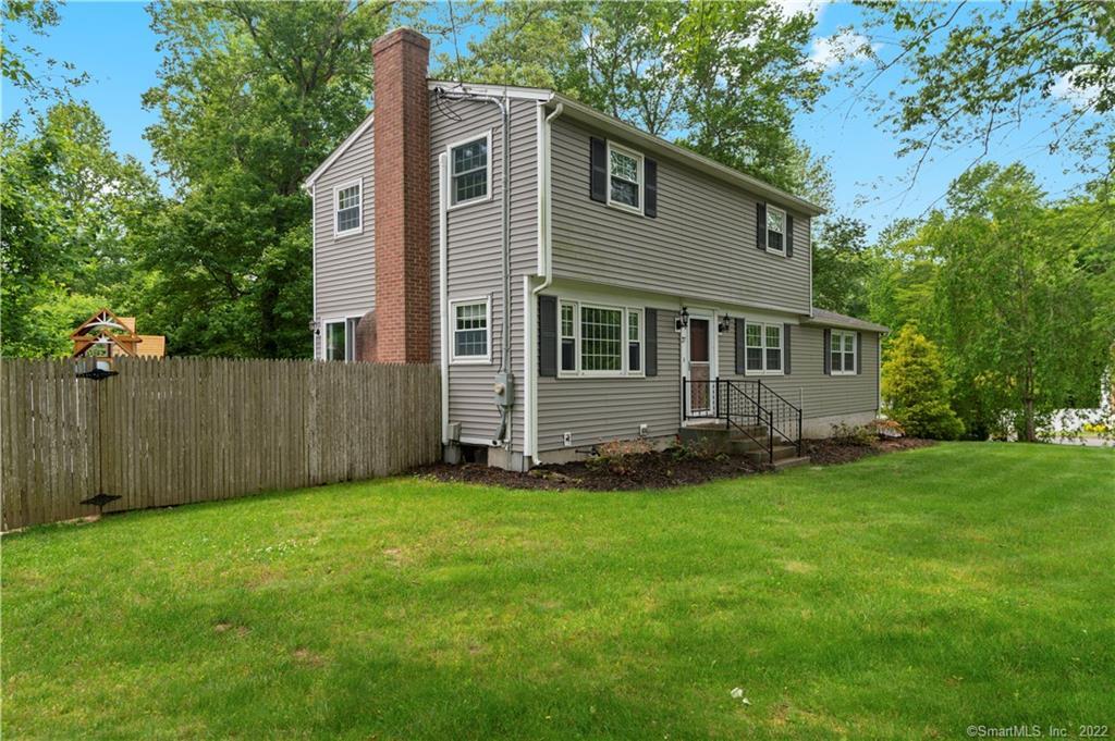 27 Cedar Road Clinton, CT 06413 - Photo 1 of 1 a view of a house with yard and sitting area