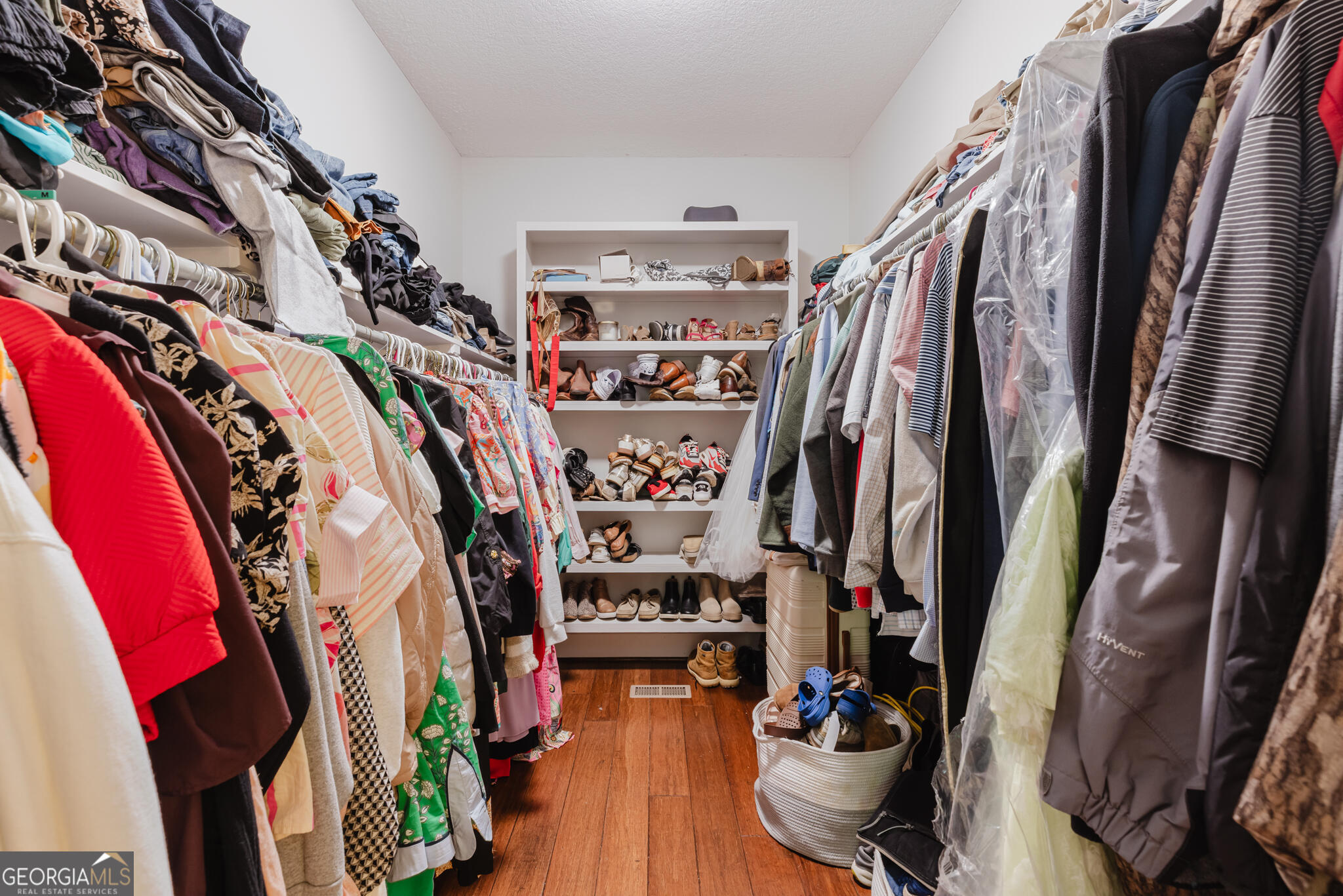 1859 Upper River Road Americus, GA 31709 - Photo 27 of 47 a view of walk in closet with clothes