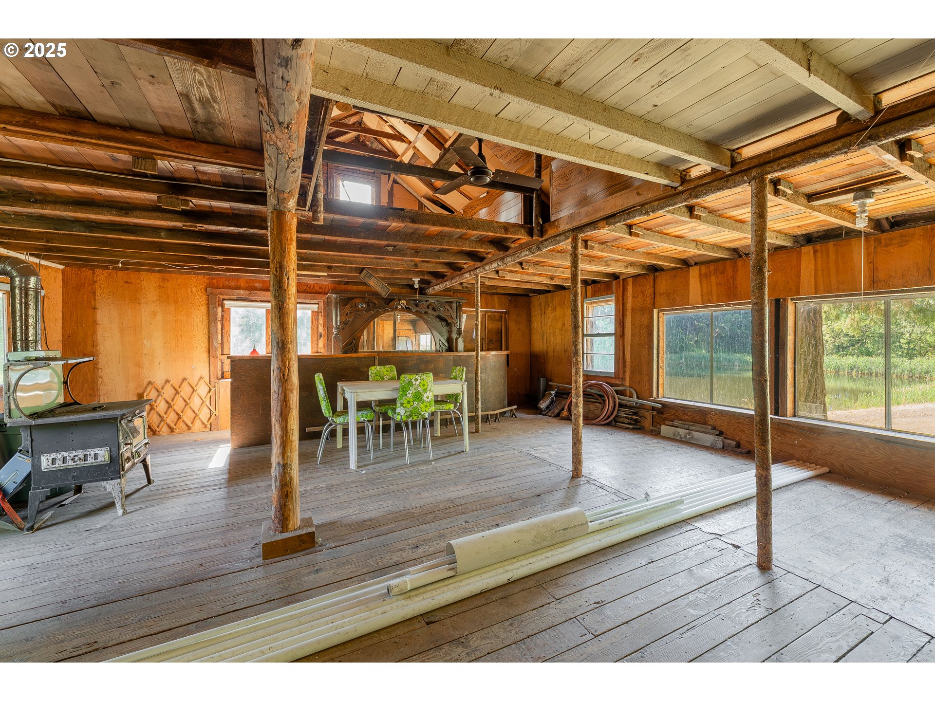 1180 Upper Cleveland Rapids Road Roseburg, OR 97471 - Photo 7 of 42 a view of dining room with wooden floor