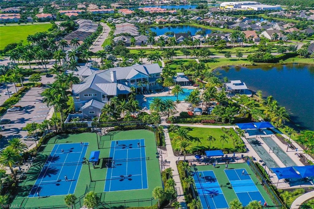 10787 Manatee Key Lane Estero, FL 33928 - Photo 26 of 31 an aerial view of residential houses with outdoor space and street view