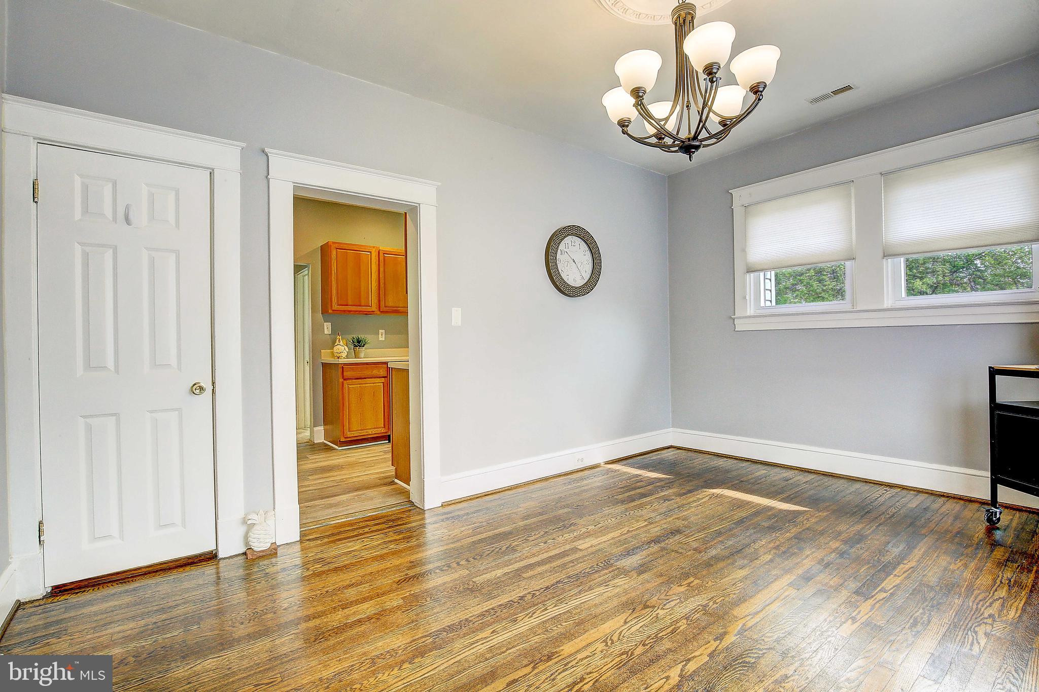 107 North Hammonds Ferry Road Linthicum Heights, MD 21090 - Photo 11 of 43 Formal dining room with tons of natural light